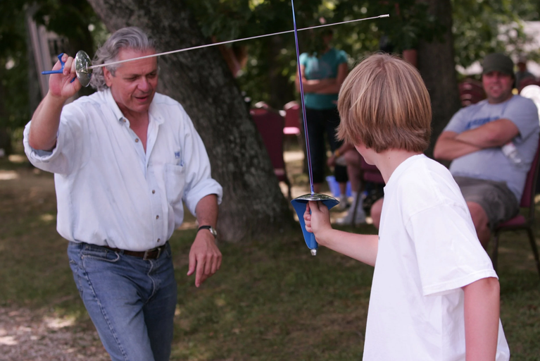 Executive Producer Carl Borack giving a fencing lesson to a cast member on the set of Saving Shiloh. (Photo: Serge Timacheff)
