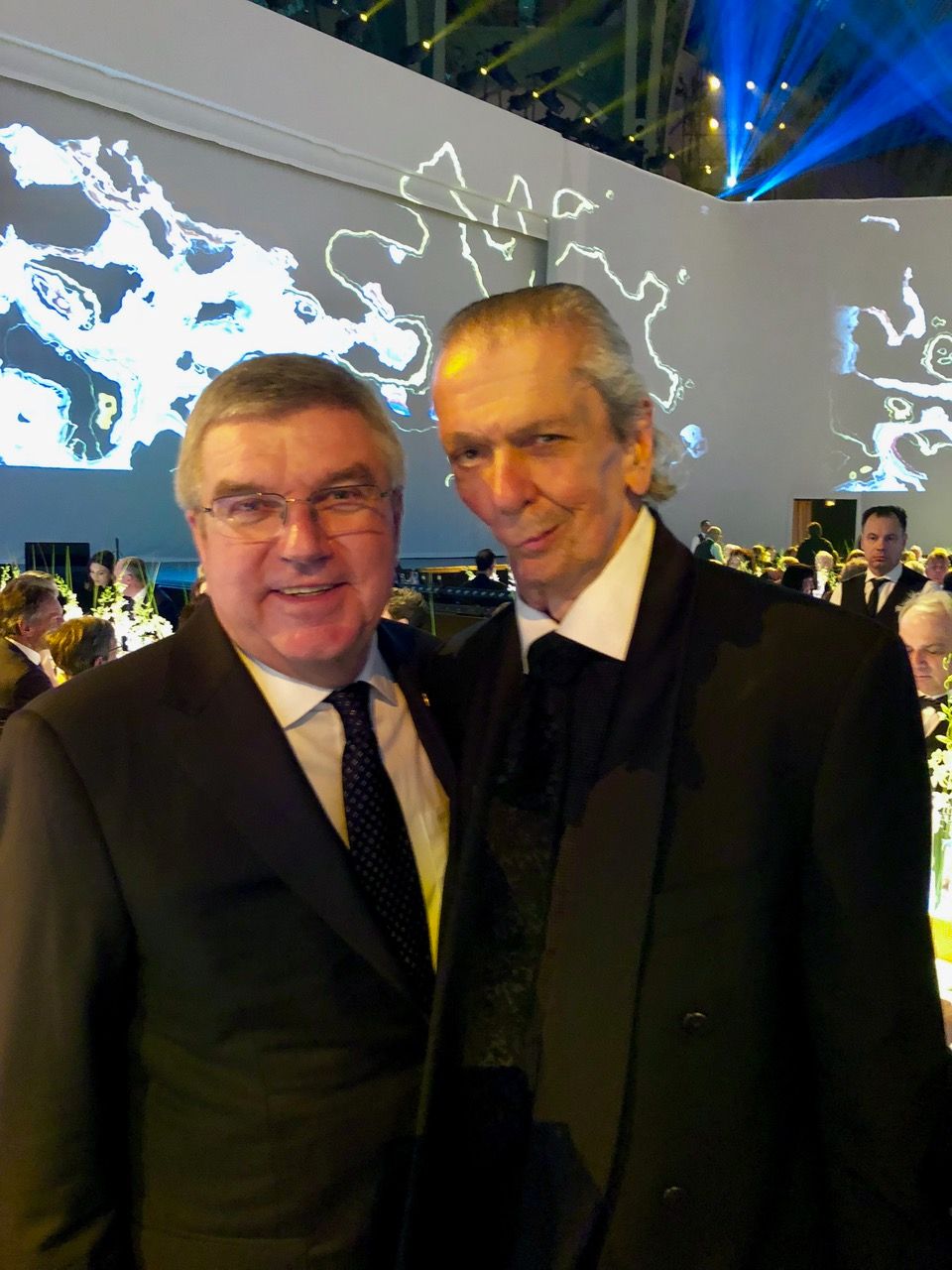 Executive Producer Carl Borack with International Olympic Committee President Thomas Bach at the FIE (International Fencing Federation) Gala after Carl's first cancer battle.